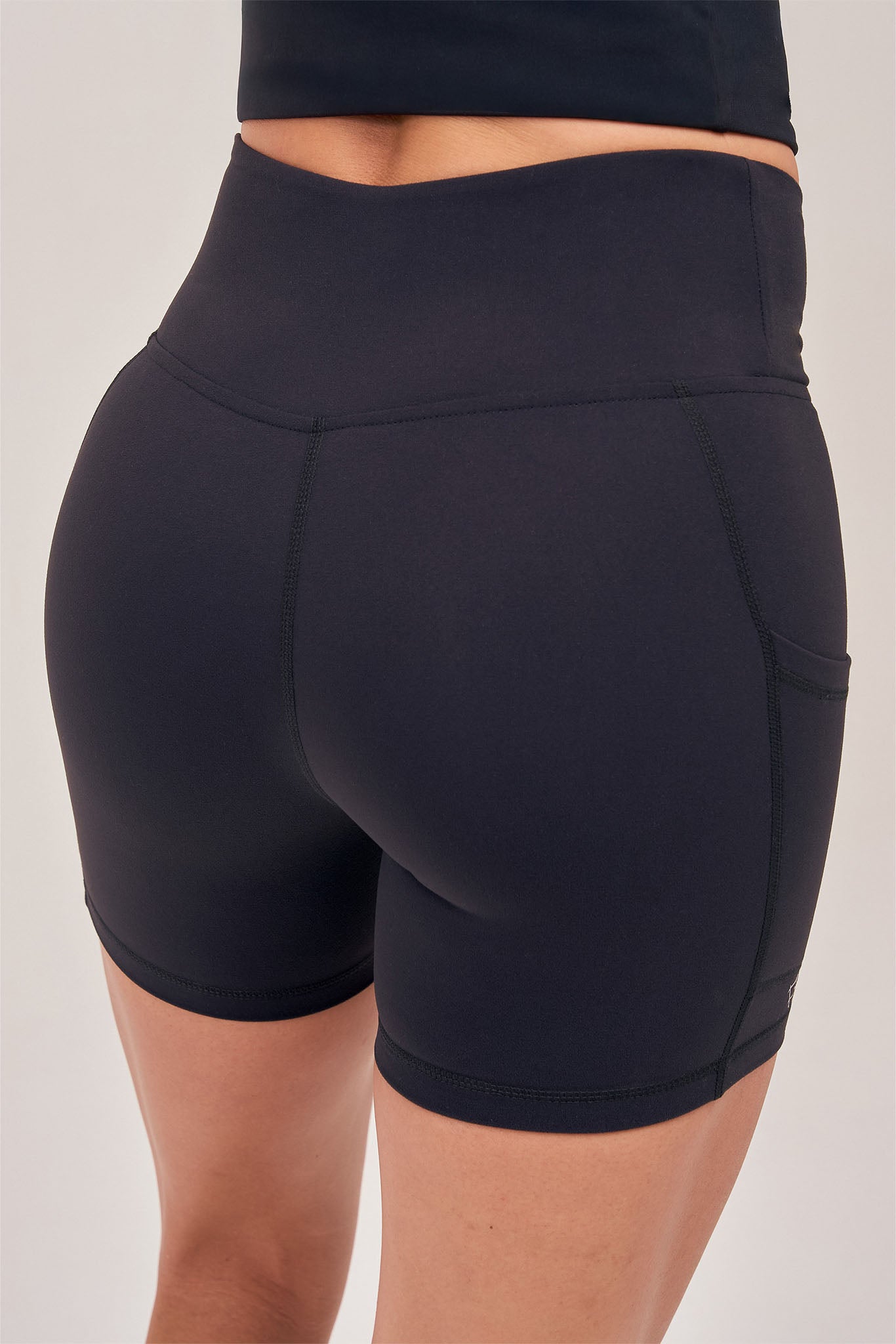 Back view of the high-waist black Control Shorts
